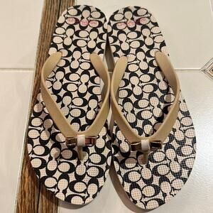 Coach rubber flip flops size 7/8 NWOT